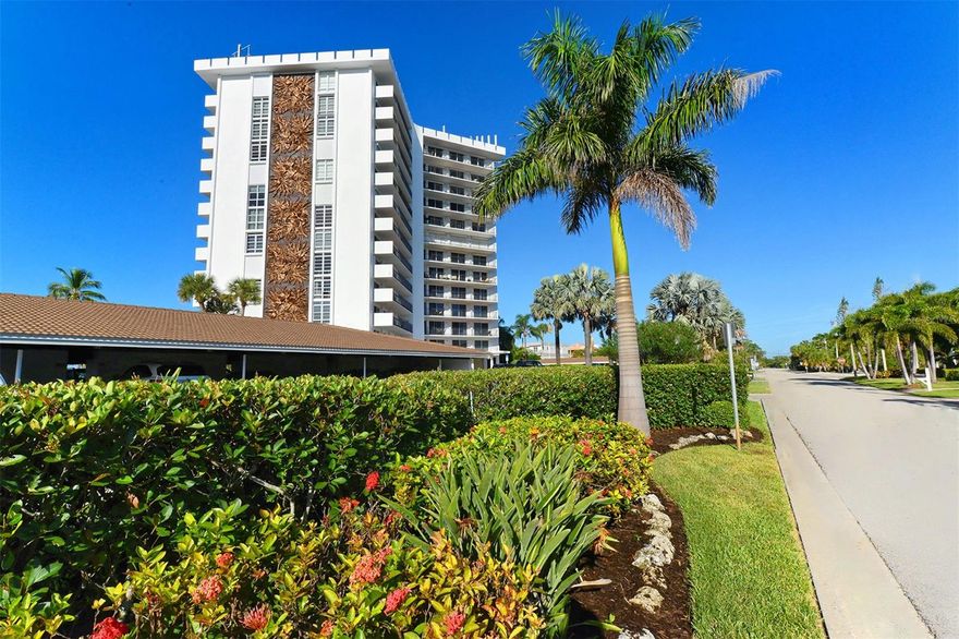 ST. ARMANDS TOWERS NORTH - Location is everything: you are steps from the sugar-white sands of Lido Beach and just one block from vibrant St. Armands Circle boutiques, galleries, and culinary experiences. This stylish northeast-facing residence on the fifth floor is sold furnished and ready for immediate enjoyment. The interior was designed for effortless elegance, featuring warm bamboo flooring, crisp crown molding, and plantation shutters that beautifully filter the Florida sun. The open-concept floor plan flows seamlessly through three sets of sliding glass doors (with new hurricane shutters) in the living room and both bedrooms, to an expansive 240 sq. ft. balcony—your private sanctuary for enjoying tropical breezes. The kitchen boasts a delightfully functional layout, with ample cabinetry, granite countertops, and stainless-steel appliances. Two full bathrooms include a primary ensuite, offering privacy for you and your guests. Convenience meets beachside luxury with an in-unit washer/dryer, large storage closet, and a dedicated covered carport space with an adjacent storage locker. The St. Armands Towers North community provides a worry-free living experience, having completed all required structural reviews. An on-site manager keeps the building in top condition, proactive maintenance keeps fees low, and the reserves are fully funded. Residents can indulge in a resort-like lifestyle with fantastic amenities, including a heated pool with Gulf views, exercise room, library, and beautiful newly remodeled community room. Location is everything, and this condo delivers. Whether you enjoy sunbathing on the sands of Lido Beach, exploring the kayak launches and nature trails of nearby South Lido Park, shopping, and dining on St. Armands, or relaxing in the splendor of your refined retreat, this property offers the ultimate island experience. A free local shuttle with a stop nearby even provides convenient transport directly to downtown Sarasota, allowing you easy access to explore the area's rich cultural offerings. Enjoy sophisticated, maintenance-free coastal living at one of Lido Key’s most desirable addresses!