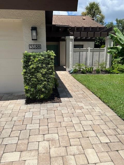 GREAT opportunity to lease a WINDRUSH BOURNE VILLA in the Meadows Community. Thoughtfully updated Villa, 2 bedroom, 2 baths, glass enclosed lanai overlooking park like garden area with pond view. Nice size kitchen with eat in space has sliders leading to the front paver patio. The Primary Bedroom en suite has two vanities with stand up shower and walk in closet with a slider leading to glass enclosed lanai overlooking rear garden area and pond view. Guest Suite is close to the guest bathroom with large tub for soaking. The laundry room has plenty of space for storage. There is a one car garage for your car or toys. This Villa is a GREAT property, clean, updated, no carpet, shows like new, awesome location close to all the activities surronding the UTC area. Downtown Sarasota and the famous beaches are a short drive away.
Association Application fee of $100.00 must be approved before move in. Please note there are no pick up trucks or motorcycles permitted to be parked outside overnight. Owner is looking for a long term lease. Please Call for appointment.