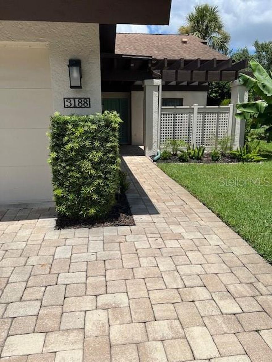 GREAT opportunity to lease a WINDRUSH BOURNE VILLA in the Meadows Community. Thoughtfully updated Villa, 2 bedroom, 2 baths, glass enclosed lanai overlooking park like garden area with pond view. Nice size kitchen with eat in space has sliders leading to the front paver patio. The Primary Bedroom en suite has two vanities with stand up shower and walk in closet with a slider leading to glass enclosed lanai overlooking rear garden area and pond view.  Guest Suite is close to the guest bathroom with large tub for soaking.  The laundry room has plenty of space for storage. There is a one car garage for your car or toys. This Villa is a GREAT property, clean, updated, no carpet, shows like new, awesome location close to all the activities surronding the UTC area. The New Mote Aquarium has opened at UTC, Downtown Sarasota, The famouse Ringling estate and the beaches are a short drive away. 
Association Application fee of $100.00 must be approved before move in. Please note there are no pick up trucks or motorcycles permitted to be parked outside overnight. Owner is looking for a long term lease. Please Call for appointment.