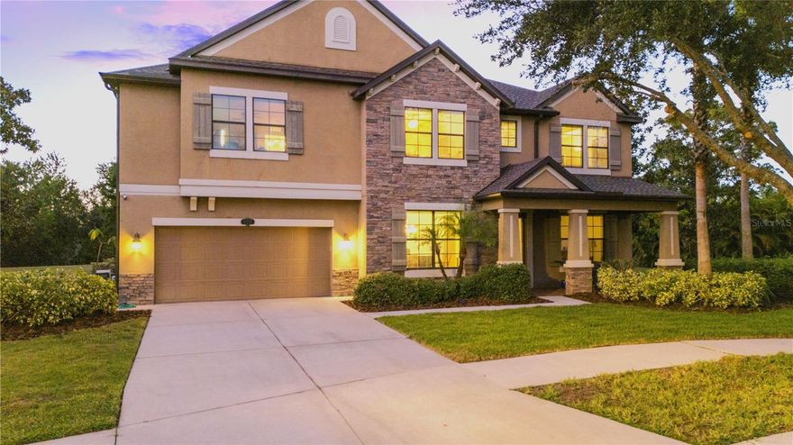 One or more photo(s) has been virtually staged. Just Listed! Where Space Meets Serenity —a perfect blend of entertaining, relaxation, and stress-free living!
Step into your own private oasis on a sprawling 0.66-acre lot in the Denmore neighborhood of Panther Trace. This 6-bedroom, 5.5-bath home offers light-filled interiors, soaring ceilings, and expansive rooms - each bedroom featuring a walk-in closet for ultimate comfort and organization. With storage everywhere, there’s space for everything and everyone.
The first-floor guest suite provides convenience and privacy for overnight guests or as an in-law suite. 
The heart of the home is a gourmet chef’s kitchen with high-end appliances, abundant counters, and exceptional storage—perfect for creating memorable meals. Entertain effortlessly indoors in multiple distinct gathering areas that flow beautifully for both intimate evenings and larger get togethers. Or, if you prefer, take the party outside to your massive outdoor kitchen and dining area, surrounded by lush landscaping, where your 12,000-gallon saltwater pool with gas heater and screen enclosure becomes a private resort for friends and family.
The sprawling backyard is perfect for family activities or pets, creating the ideal setting for outdoor fun and relaxation. The oversized lot ensures complete privacy while providing space to spread out and enjoy the Florida lifestyle.
The oversized 3-car garage with Tesla charging station provides exceptional storage for vehicles, tools and recreational gear.  With the brand-new 2025 roof, this home combines style, comfort, and function. From everyday living to large-scale entertaining, this estate offers endless space, abundant storage, and a lifestyle of luxury and privacy.
Ideally located near dining, shopping, and major highways (I-75, I-4 and the Lee Roy Selmon Crosstown Expressway), this home offers the perfect combination of privacy, convenience, and resort-style living - just 20 minutes from downtown Tampa.