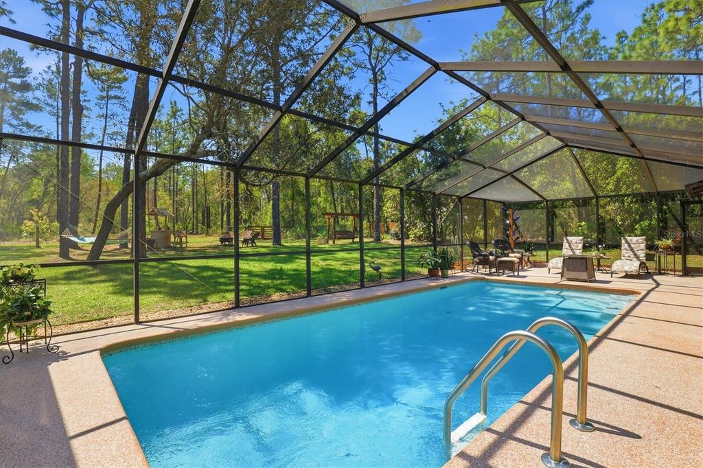 Photo of 9032 Birmingham Avenue, Weeki Wachee, FL 34613 (MLS # W7885838)
