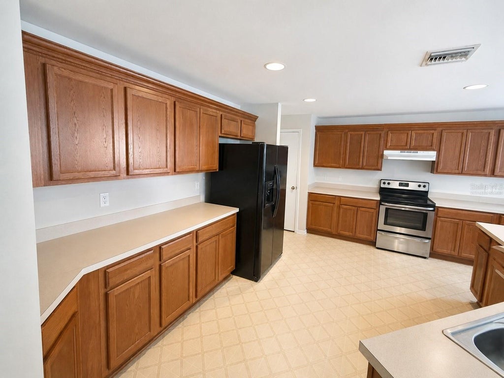 Photo of 21468 Dawson Avenue, Port Charlotte, FL 33952 (MLS # TB8541123)