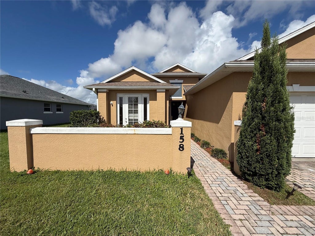 Photo of 158 Magic Landings Boulevard, Kissimmee, FL 34744 (MLS # O6438743)