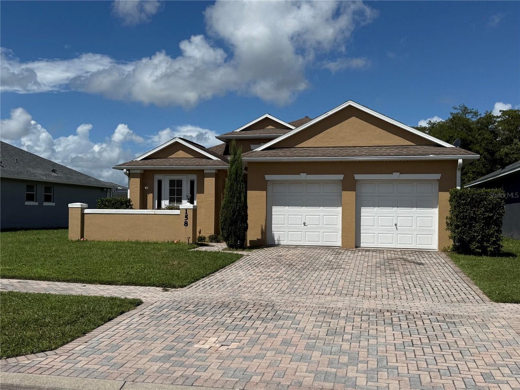 Photo of 158 Magic Landings Boulevard, Kissimmee, FL 34744 (MLS # O6438743)