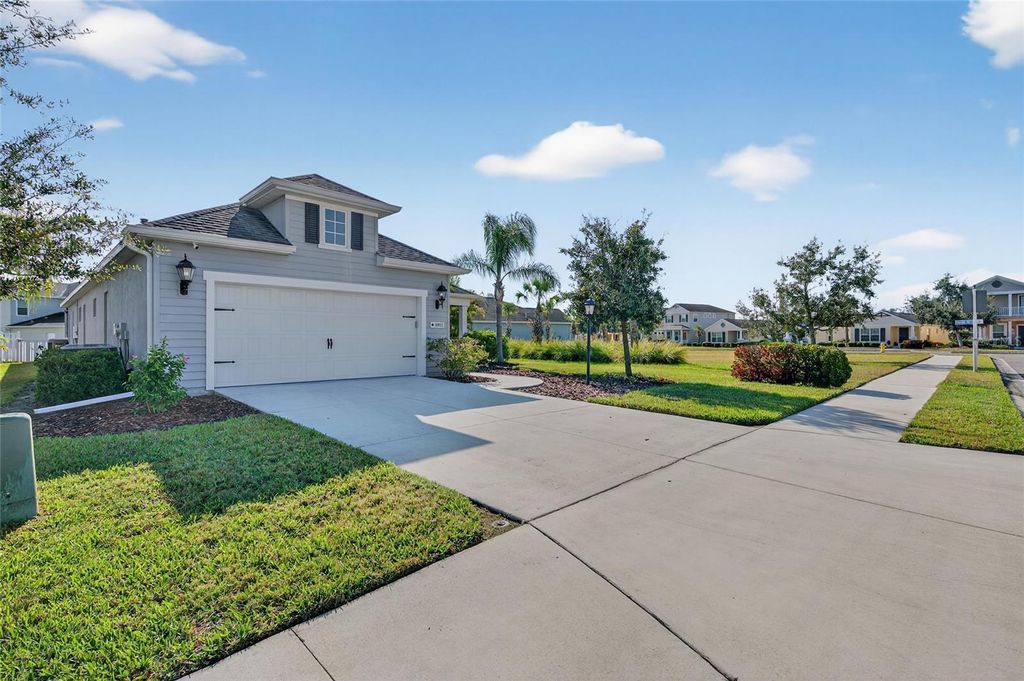 Photo of 10915 Blue Magnolia Lane, Parrish, FL 34219 (MLS # TB8450606)