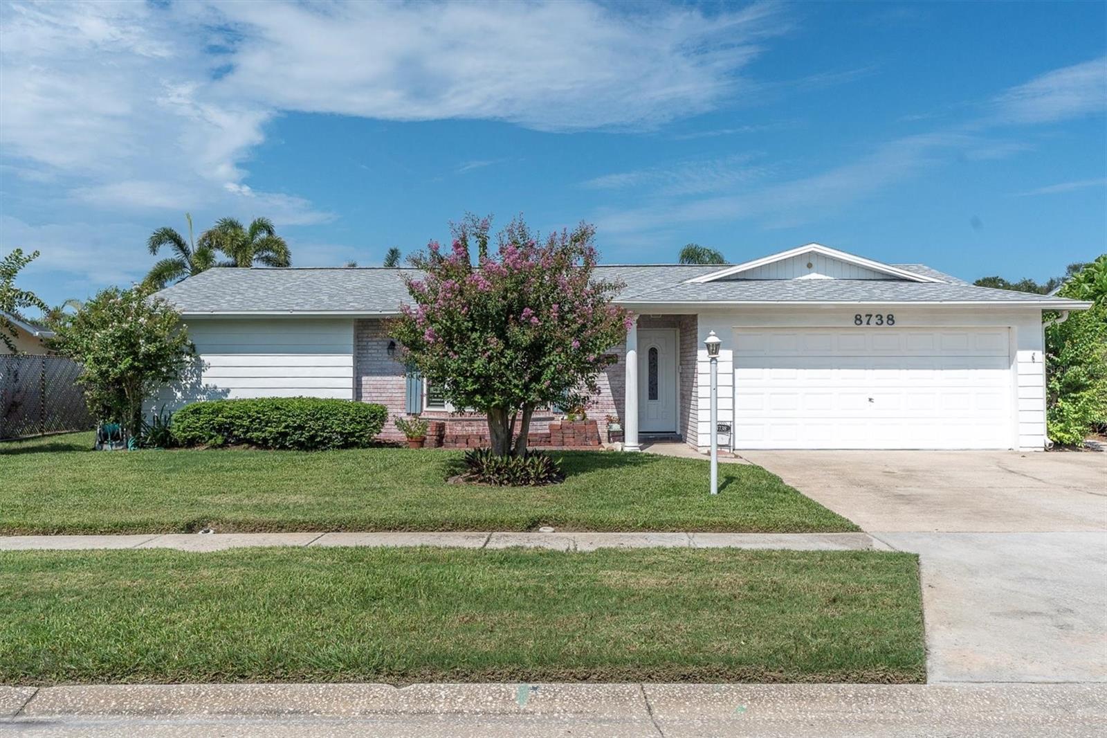 You’ve heard the saying — when it comes to real estate, it’s all about LOCATION, Location, Location. This beautifully maintained desirable home delivers not just location, but so much more. Offering 4 TRUE BEDROOMS, 2 FULL BATHS, a 2-CAR-GARAGE, and 2,197 SQ. FT. OF LIVING SPACE, SPLIT-PLAN DESIGN and nestled in an X FLOOD ZONE (NO EVACUATION REQUIRED) in the community of Leona Heights. Inside, you’ll find a SPACIOUS KITCHEN with AMPLE COUNTER SPACE and CABINETS, a DINETTE AREA and BREAKFAST BAR, STAINLESS STEEL APPLIANCE SUITE, 4 DOOR PANTRY, INSIDE LAUNDRY ROOM, NEW ROOF (2023), AC (2020), Reme Halo Airflow AC filter system, updated electrical panel(2018) and HURRICANE SHUTTERS for peace of mind. A charming BAY WINDOW decorated with PLANTATION SHUTTERS brightens the formal living room, while the formal dining area is perfect for holiday gatherings. Every room features generous square footage and the desirable layout flows seamlessly, with the kitchen opening into a GENEROUS FAMILY ROOM that extends to the patio and a beautifully landscaped backyard—ideal for pets, BBQs, family get-togethers, and even large enough to add a pool. Located just minutes from top-rated Seminole schools, the Pinellas Trail, SYAA fields, Seminole City Center, and only a quick 10-minute drive to our world-famous beaches, this home truly offers the perfect place to settle in and make it your own. (Note: room measurements are approximate.)