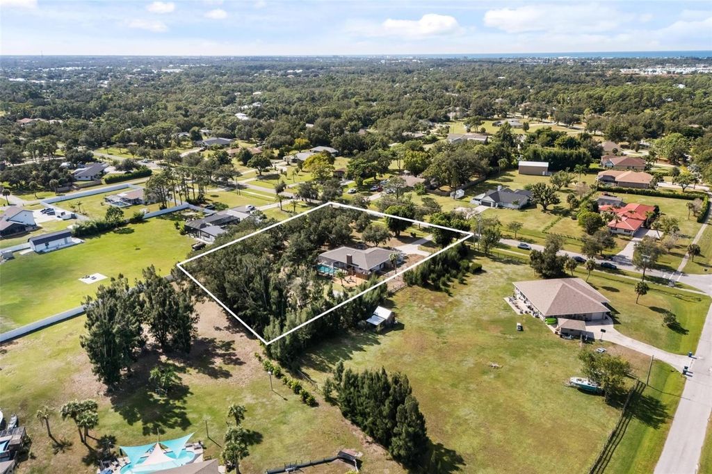 Photo of 1860 Mackintosh Boulevard, Nokomis, FL 34275 (MLS # N6140687)