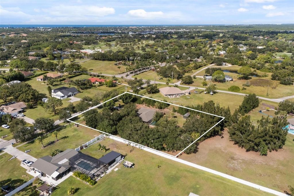 Photo of 1860 Mackintosh Boulevard, Nokomis, FL 34275 (MLS # N6140687)