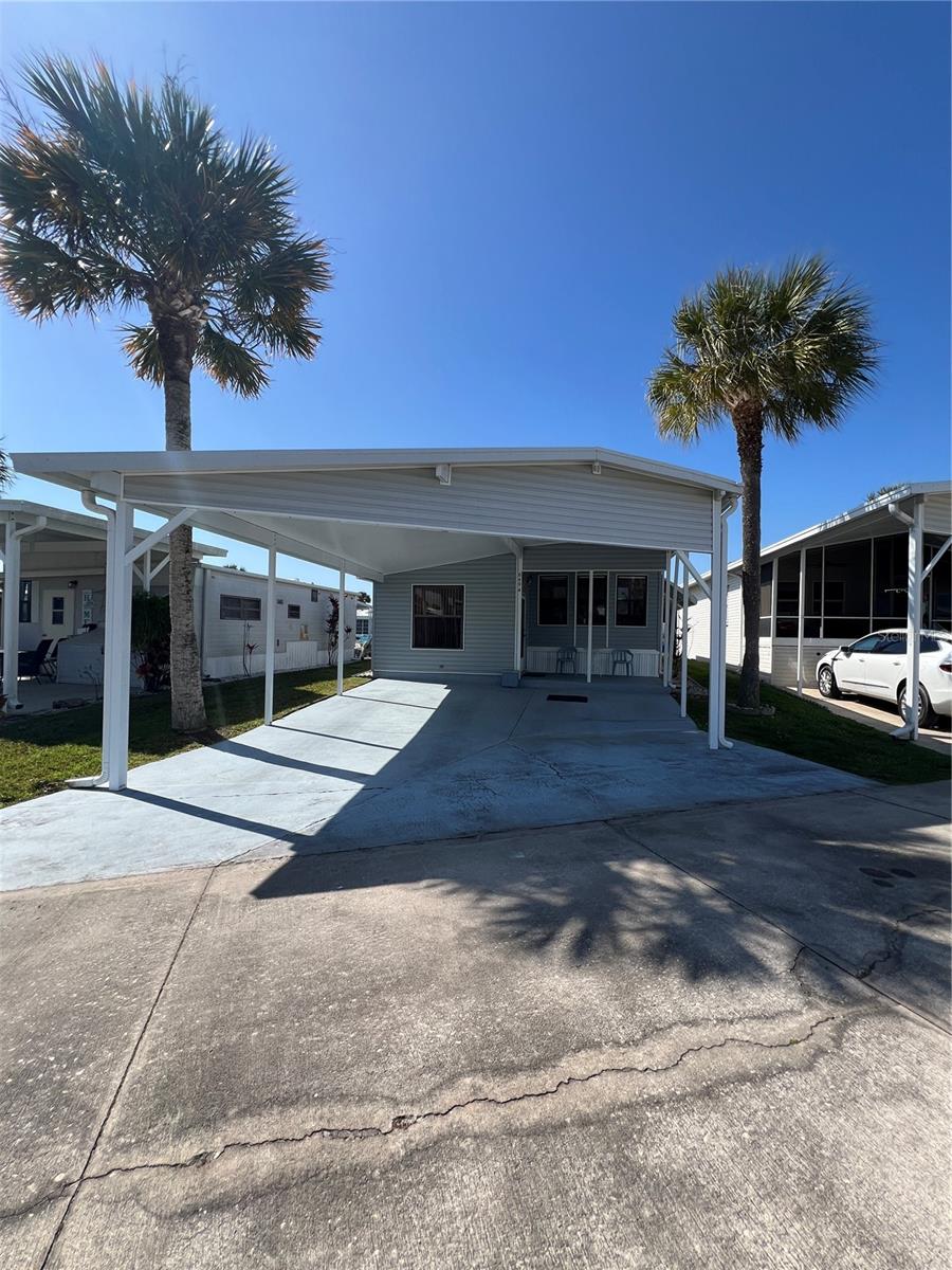 ~Ancient Oaks~ 55+ Community. 2 Bed 1 Bath Park model w/addition. Furnished- on a double street. Huge carport for Truck & Boat or 2 vehicles. Outside shed with washer & dryer,