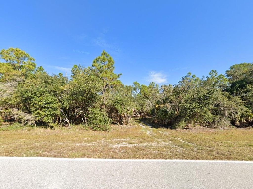 Photo of 17038 Wintergarden Avenue, Port Charlotte, FL 33948 (MLS # C7505972)
