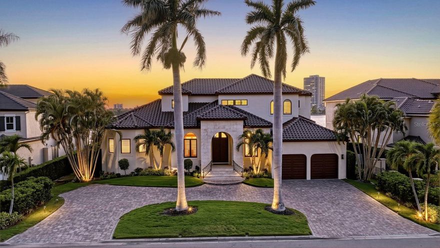 Open bay sunsets, deep water access, and timeless coastal architecture define this exceptional Bird Key waterfront residence.

Positioned on a quiet cul-de-sac along Sarasota Bay, this extensively updated bayfront home offers panoramic open water views, refined living spaces, and direct Gulf access with no fixed bridges. With approximately 100 feet of waterfront frontage and a new dock completed in 2023 accommodating up to a 60-foot vessel, the property is ideally suited for both motor yachts and sailboats while embracing Sarasota’s boating lifestyle.

Inside, the residence balances warmth and scale with expansive living spaces, detailed millwork, and a thoughtful floor plan designed for both everyday comfort and entertaining. Beautiful renovations throughout have created a move-in ready environment, including a completely remodeled primary bedroom and bath, a full kitchen renovation in 2023 featuring Sub-Zero and Viking appliances, updated second-floor bathrooms, redesigned TV room with custom fireplace and cabinetry, and a temperature-controlled 140-bottle wine wall and bar installation.

Walls of hurricane-rated Pella windows and sliding doors frame open bay views while allowing natural light to move throughout the interiors. Marble, wood, and carpeted flooring, custom cabinetry, wood-paneled accents, and integrated audio systems contribute to the home’s tailored yet inviting atmosphere. Additional upgrades include a replaced seawall, resealed and painted roof, fresh exterior paint, replaced garage doors, sealed driveway, instantaneous hot water system, and updated air conditioning systems.

Outdoor living is centered around sweeping sunset views, expansive waterfront terraces, and the privacy of a generously sized homesite within Bird Key. Residents enjoy immediate access to downtown Sarasota, St. Armands Circle, Lido Beach, Bird Key Yacht Club, and the area’s renowned dining, shopping, and cultural attractions while returning home to the quiet character of this residential island community.

A beautifully maintained bayfront residence offering exceptional boating access, open water views, and a location that remains one of Sarasota’s most desirable waterfront settings. Private showings available by appointment.