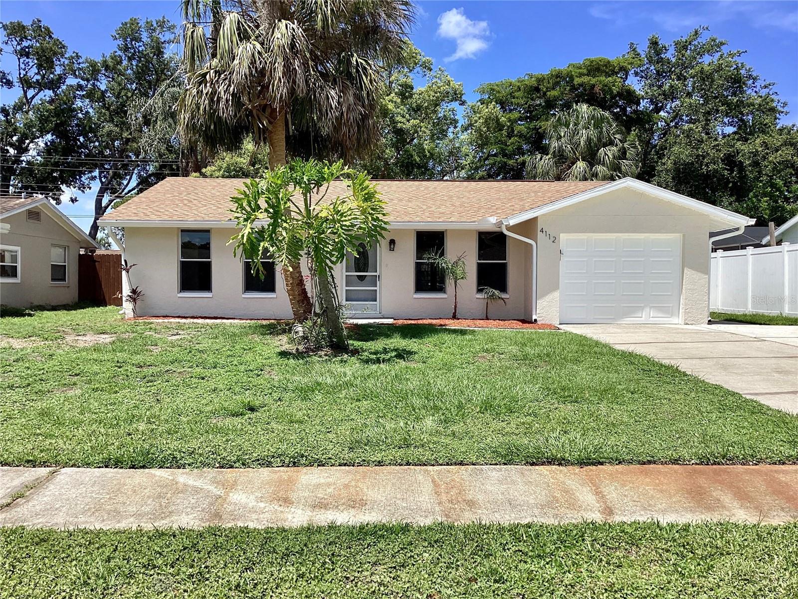 Wow..10k reduction! Looking for an affordable home on a fenced lot with no HOA in the heart of Sarasota? This affordable, move in ready home has had some recent updates including a new roof, and is in a popular location off Bee Ridge Rd. The property features 2-bedrooms, 2-baths and 1098 sq ft of living space, with a large porch and backyard patio area. The interior has been refreshed with a new laminate floor in the kitchen and new paint on the interior and exterior. The kitchen has a cute breakfast bar that opens to the dining room. The primary bedroom has an updated en-suite bath and there are sliders that open to the patio area. Bedroom 2 is large and has its own walk-in closet. An attached one car garage offers convenience and additional storage space. South Ridge is in a top-rated school district with easy access to US 41, I-75, and all area amenities. This is a perfect home for first time buyers, snowbirds, or investors. Easy to show.
