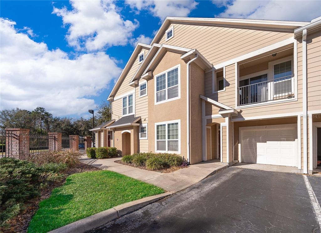 Photo of 1101 Vintage Village Lane #103, Ocoee, FL 34761 (MLS # O6385874)