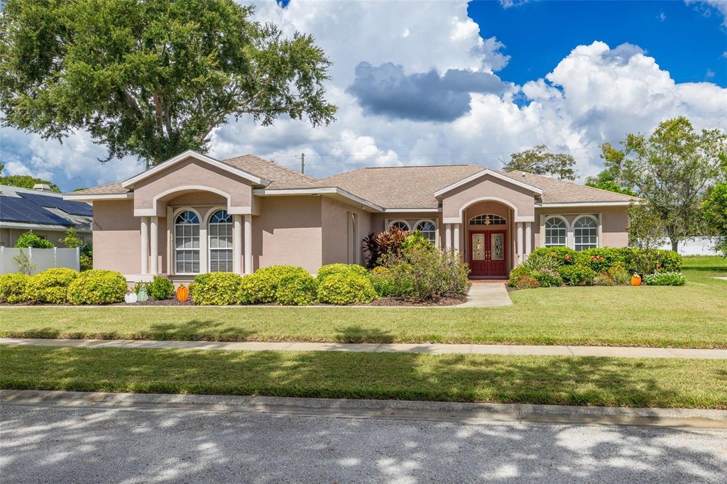 Photo of 1555 Sunray Drive, Palm Harbor, FL 34683 (MLS # TB8554514)
