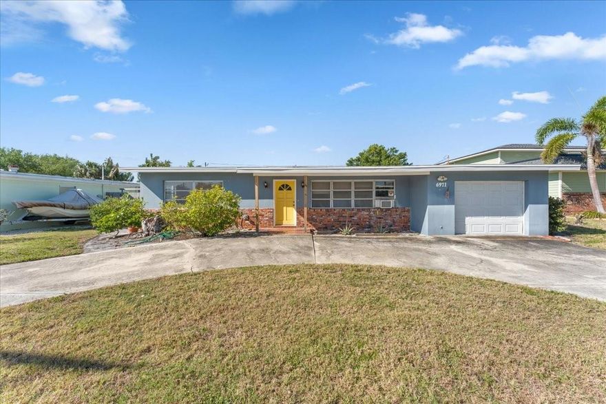 Located in the highly sought-after waterfront community of Pasadena Isle, this property presents a rare opportunity in one of St. Petersburg’s most desirable enclaves. With approximately 120 homes, Pasadena Isle is known for its quiet streets, strong sense of community, and prime location just minutes from the Gulf beaches, downtown St. Pete, and Pasadena Yacht & Country Club.

This 3-bedroom, 2-bath home sits on a beautiful lot and features a welcoming front porch, a spacious U-shaped driveway for ample parking, and a generously sized garage, offering a solid foundation for your vision.

The home sustained flooding during Hurricane Helene and is being offered as a renovation or redevelopment opportunity. Buyers may choose to restore and customize the existing structure or take advantage of the lot to design and build a new home in a premier waterfront neighborhood.

Whether you’re an investor, builder, or end-user looking to create a custom residence, opportunities like this in Pasadena Isle are limited. Unlock the potential and bring your vision to life in one of St. Pete’s most established and desirable communities.