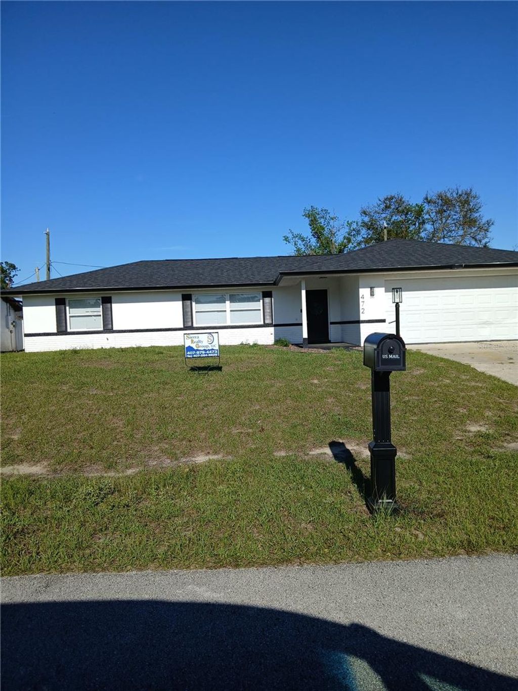Photo of 472 Bali Terrace, Deltona, FL 32725 (MLS # O6392374)