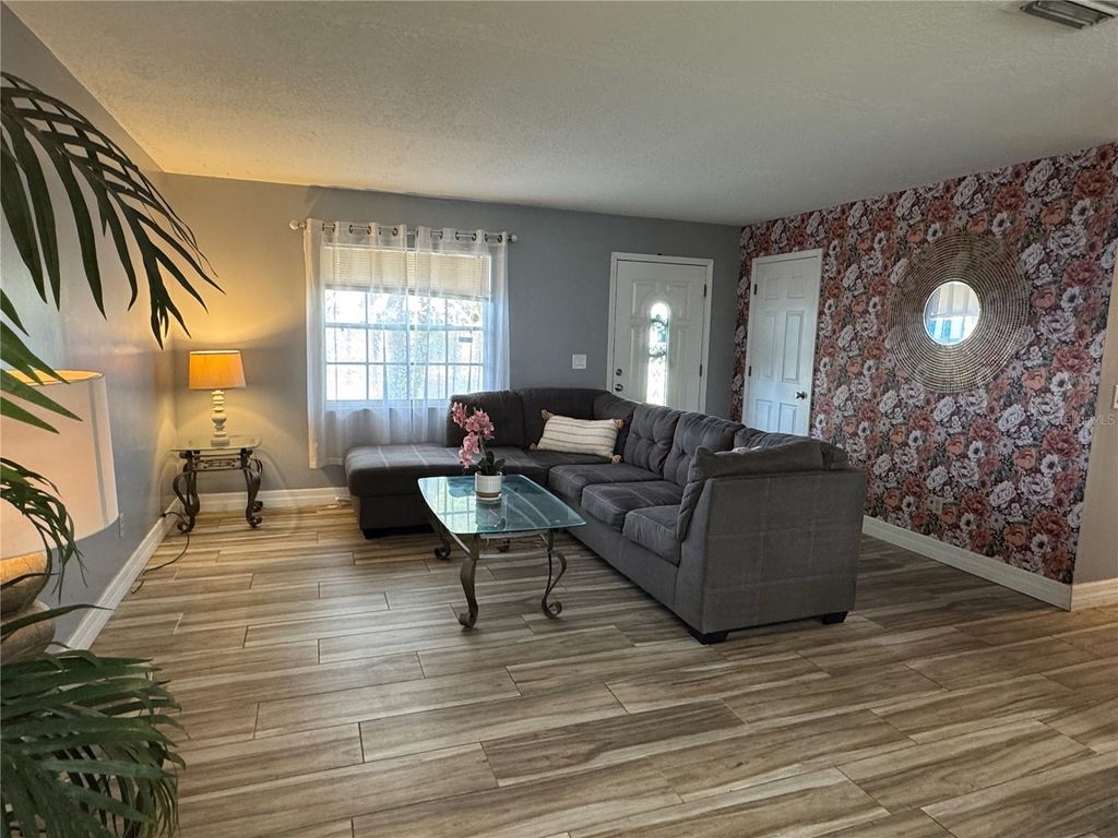 Photo of 7556 Hidden Hollow Drive, Orlando, FL 32822 (MLS # O6368773)