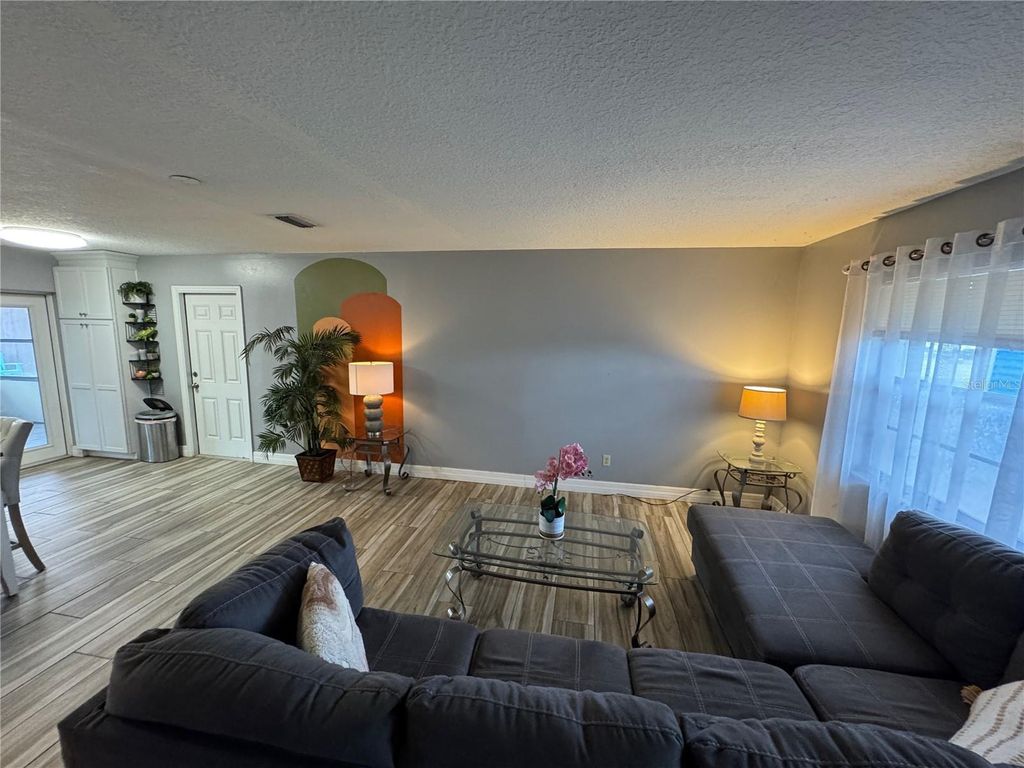 Photo of 7556 Hidden Hollow Drive, Orlando, FL 32822 (MLS # O6368773)