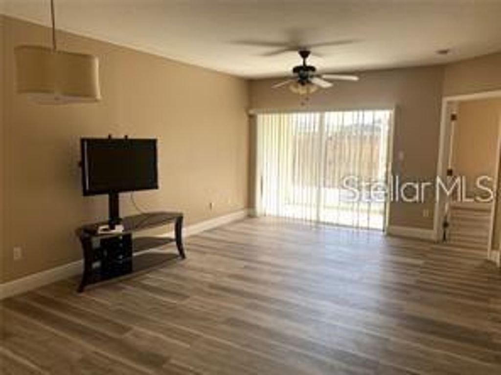 Photo of 502 Villa Del Sol Circle #103, Orlando, FL 32824 (MLS # S5140318)