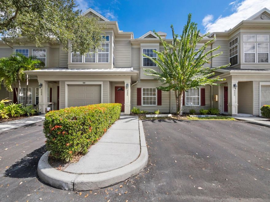 Welcome to this delightful two-story townhouse nestled in the heart of University Park, offering the perfect blend of convenience and carefree living. Set in a gated, maintenance-free community you will be surrounded by beautifully landscaped grounds that create a serene setting. This residence spans 1,168 square feet and features 2 spacious bedrooms and 2.5 baths. The main level provides a thoughtful layout with an open living and dining area creating a warm and inviting atmosphere along with a convenient half bath. A private patio extends your living space outdoors, perfect for enjoying your morning coffee or unwinding in the evening. The second-floor features two spacious primary suites that include walk-in closets and en-suite bathrooms offering comfort and convenience. Additional features include an in-unit laundry closet, under-stairwell storage, a linen closet, and two parking spaces. Residents of the Carolina Landings community enjoy access to a clubhouse, sparkling pool, fitness center, and walking trails designed to support an active and vibrant lifestyle. Peace of mind comes with community-wide new roofs, concrete construction, and LOW HOA fees. Conveniently located near the UTC Mall, Benderson Park, Whole Foods, and I-75, with easy access to upscale shopping, dining, and entertainment options. Whether you are a first-time homebuyer, a seasonal resident, or simply seeking a stress-free Florida retreat, this townhome is an outstanding opportunity in one of University Park’s prime locations.