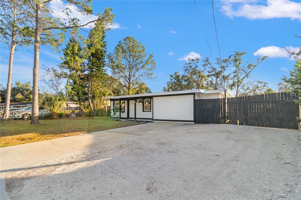 Photo of 6903 Travis Boulevard, Tampa, FL 33610 (MLS # TB8458920)