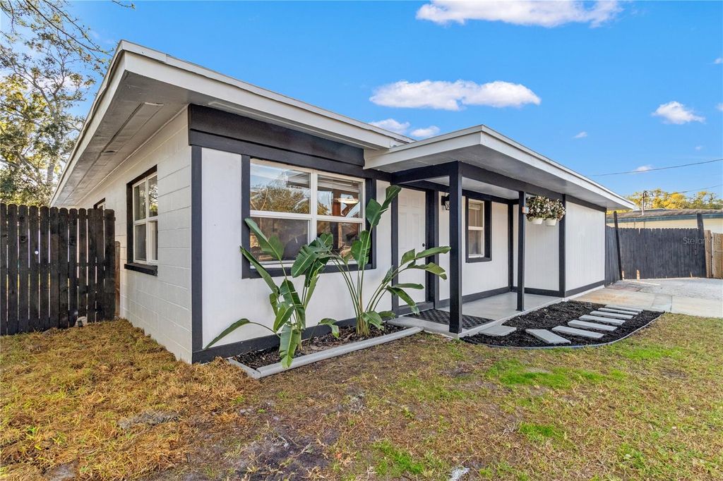 Photo of 6903 Travis Boulevard, Tampa, FL 33610 (MLS # TB8458920)