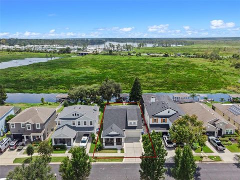 Photo of 720 Barefoot Bay Loop, Groveland, FL 34736 (MLS # O6341471) Photo of 720 Barefoot Bay Loop, Groveland, FL 34736 (MLS # O6341471)