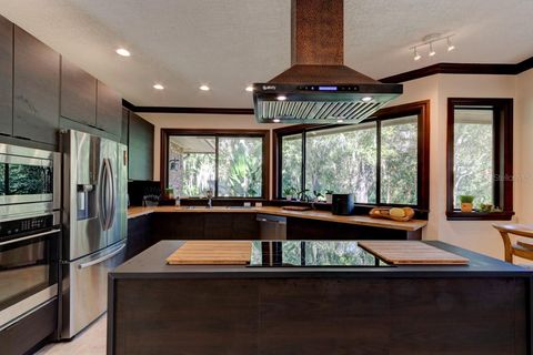 Photo of 1811 E Spruce Creek Boulevard, Port Orange, FL 32128 (MLS # NS1086801)