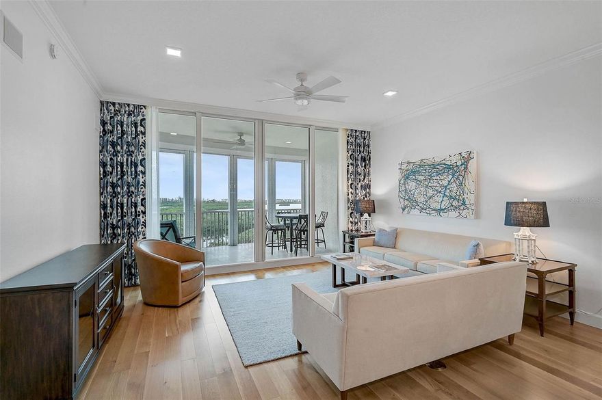 **TURNKEY FURNISHED, PENTHOUSE Condo Unit has been FULLY RENOVATED**  This 8TH FLOOR, Light and Bright, 3-BEDROOM plus 3 FULL BATH dwelling with screened balcony is available beginning in September, 2025. The 2055sf floorplan is tastefully furnished and offers superb views of the Intracoastal Waterway and Gulf.  This unit was fully renovated in 2023 with updated oak hardwood flooring, new kitchen cabinets and appliances, marble bathrooms and beautiful light fixtures and chandeliers. Indulge in spacious, carefree living with three thoughtfully designed bedrooms, each offering a blend of comfort and style and each with its own bathroom. The third bedroom has been converted to a den/office with a sleeper sofa. The gourmet kitchen is equipped with high-end stainless-steel appliances, wine chiller, quartz countertops, spacious bar and dining area. Open concept living space allows for indoor/outdoor living and taking in the breathtaking sunsets.  Experience the pinnacle of security and privacy with 24/7 gated community living, secured building and elevator entrance directly to your unit. Your guests will enjoy exclusive use of pool, jacuzzi, fitness center, grilling area and clubhouse for social gatherings. Scenic walking trails throughout the neighborhood. The Oaks-Preserve is just minutes from nationally ranked Pine View School, the Legacy Bike Trail, Area Beaches including #1 Rated Siesta Key and all that Gulf Coast living has to offer.  **Available Oct. 1st, Pets Allowed.**