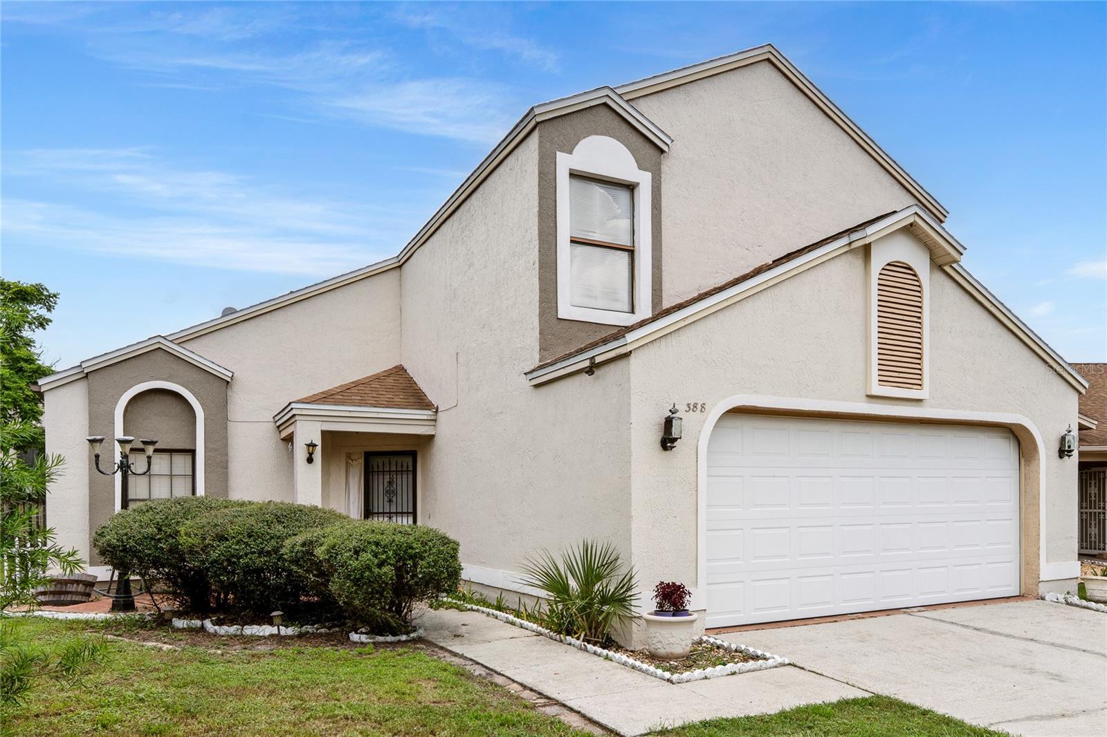 Investor Special in Prime Lake Mary – Great Bones, Desirable Location & Top Schools!
Nestled in the peaceful and established community of Lakeview Village—within The Crossings of Lake Mary—this two-story home offers a rare opportunity to renovate in one of Seminole County’s most desirable areas. Tucked away on a quiet cul-de-sac lot, this home features 3 bedrooms, 2.5 baths, and over 1,500 sq. ft. of flexible living space, ideal for investors or buyers looking to customize a home with solid structure and great potential.
A charming exterior and large lot welcome you to a decorative white front door with glass insets, opening into a dramatic two-story foyer with 19-foot ceilings. The formal living room is a highlight, featuring a striking stacked stone wood-burning fireplace, perfect for future design focal points. The space flows into a light-filled family room, thanks to thoughtfully placed windows dressed in blinds.
The kitchen is equipped with oak-toned cabinetry, decorative brown countertops, a stainless-steel sink, and a full appliance package. It opens to a cozy sitting area, providing excellent flow for future renovations and modern layouts.
The primary suite, located conveniently on the first floor, features a neutral palette, a walk-in closet, and a spacious en-suite bath with dual sinks, a soaking tub, tiled floors, and a glass-enclosed shower. A half bath with original finishes and a dedicated laundry room with ample space complete the main level.
Upstairs, the white staircase leads to two additional spacious bedrooms, both with neutral tile flooring, and a shared full bath.
Step outside to a screened-in patio overlooking the spacious backyard—ideal for entertaining or creating your dream outdoor space.
This home is zoned for top-rated Seminole County schools, including:
Greenwood Lakes Elementary
Greenwood Lakes Middle
Lake Mary High School
Enjoy a prime location just minutes from Lake Sylvan Sports Complex, public parks, the Seminole Soccer Complex, SunRail, shopping, dining, and major highways.
While this home needs cosmetic updates and some TLC, its location, layout, and structural integrity make it a smart investment opportunity. Renovate to your taste or flip for future resale—this is one you don’t want to miss.