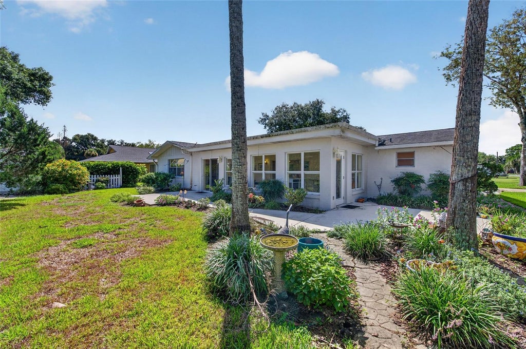 Photo of 802 Sandwedge Drive, New Smyrna Beach, FL 32168 (MLS # NS1089132)