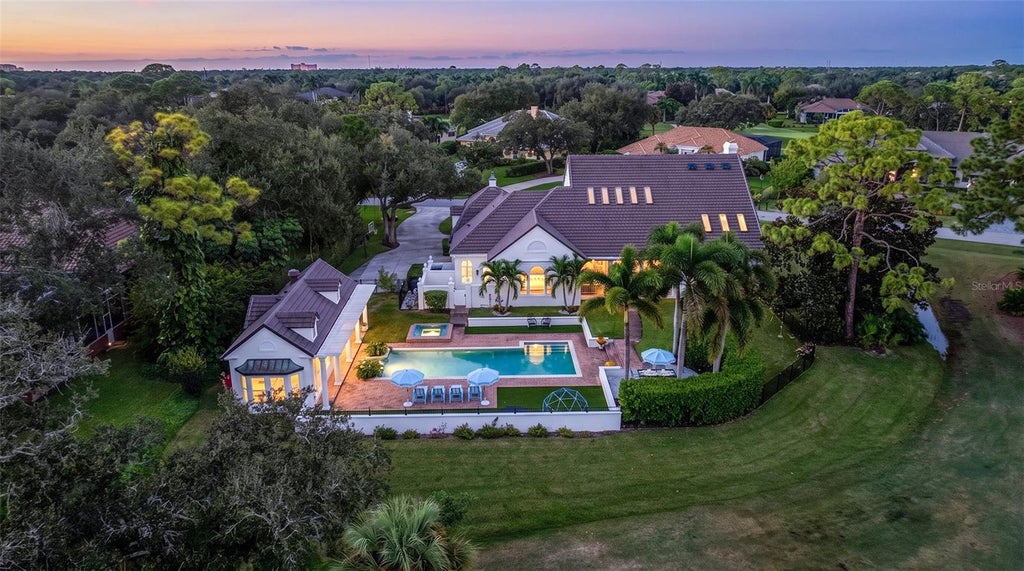 Photo of 871 Macewen Drive, Osprey, FL 34229 (MLS # A4710732)