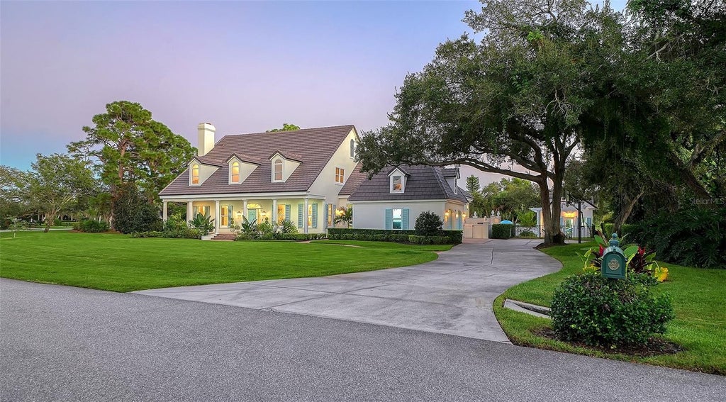 Photo of 871 Macewen Drive, Osprey, FL 34229 (MLS # A4710732)