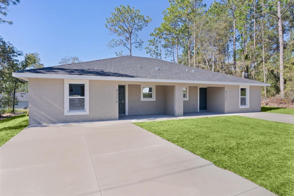 Photo of 9170 N Travis Drive, Citrus Springs, FL 34434 (MLS # O6359752)