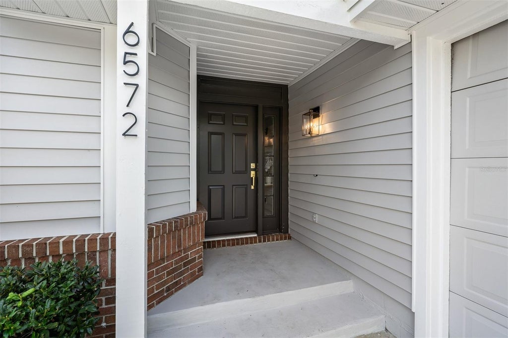 Photo of 6572 Abercrombie Court, Orlando, FL 32835 (MLS # O6437667)