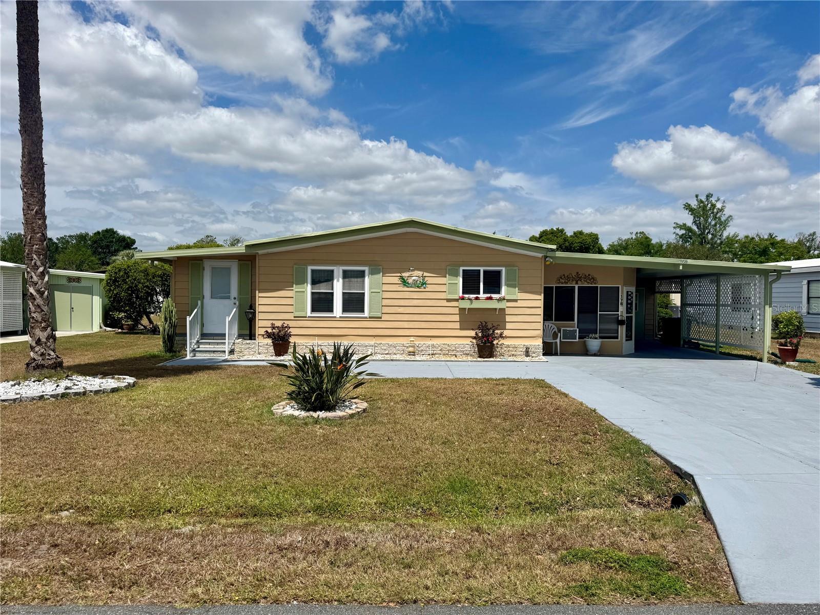 PRICE ADJUSTMENT!! Come TAKE A LOOK!! Welcome to this beautifully updated 2-bedroom, 2-bath turnkey home, move-in ready and full of value! This charming property has been thoughtfully upgraded with newer double-pane windows, a newer AC, newer hot water heater, and a newer roof-over, providing lasting peace of mind. Both bathrooms have been remodeled. Golf cart comes with the home!
Enjoy the added space of a bright Florida room with windows and a versatile bonus room that increases the overall square footage—ideal for a hobby space, home office, or extra guest area. The open, airy layout is warm and inviting, perfect for both relaxing and entertaining. The home also includes a Resident Owner Certificate, offering extra perks within the community.
Living here means enjoying access to an incredible array of resort-style amenities, including a championship golf course, on-site restaurant with live entertainment and dancing, state-of-the-art fitness center, pickleball and tennis courts, billiards, woodworking shop, craft room, and more. For nature lovers, there are beautiful walking and nature trails, and Lake Okahumpka is just minutes away—perfect for kayaking, fishing, or soaking up Florida’s natural beauty.
Whether you're looking to stay active, make new friends, or simply unwind in a peaceful setting, this home offers the ideal combination of comfort, community, and lifestyle.
Call your agent today for more info—don’t miss your chance to experience it all! Schedule your private tour today!