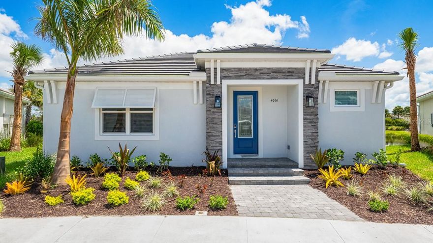 New Construction – Ready Now! Built by Taylor Morrison, America’s Most Trusted Homebuilder. Welcome to the Lucca at 4066 Santa Caterina Boulevard Unit 101 in Esplanade at Azario Lakewood Ranch! Step inside through the welcoming front porch to find a secondary bedroom and full bath. The open-concept great room flows into the kitchen and out to a private lanai—perfect for relaxing or entertaining. The primary suite is tucked away for privacy and features a spa-inspired bath and walk-in closet. Designer finishes and tray ceilings add elegance. Each Lucca Cottage includes a detached garage and golf membership. MLS#A4663558
Resort-Style Living at Esplanade at Azario Lakewood Ranch, the perfect blend of relaxation and recreation! Enjoy the heated resort-style pool, state-of-the-art fitness center, and energizing aerobics classes. For outdoor enthusiasts, there are pickleball courts, scenic trails, Vitality Park, and if golf is your game, you'll love Esplanade's 18-hole championship course! Unwind with a facial massage or by the fire pit after a workout. Exclusive amenities like a Wellness Center, Culinary Center, and sports courts ensure there's something for everyone, whether you want to stay active or relax in style.