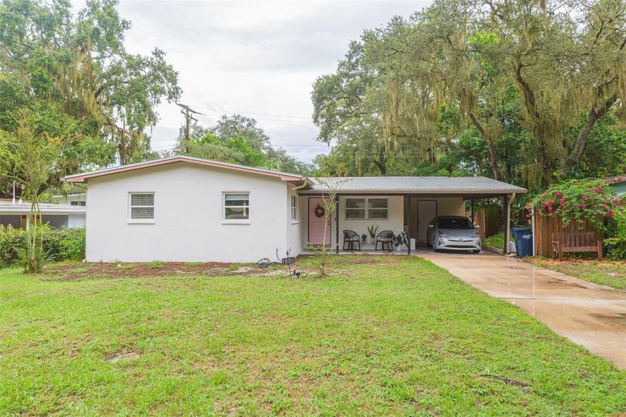 3 bedroom, 1 bath fixer upper in Old Seminole Heights!  One block from the river... Covered front patio with tongue and groove ceiling introduces living room with crown molding and French doors overlooking the back yard.  The dining room follows connecting to the kitchen. This space has been wisely designed with 42” maple cabinetry around the U.  Terrazzo flooring throughout.  Paint colors are up to you since only the music room was recently completed.  Fun light fixtures too!  All three bedrooms are in the west wing.  The bathroom has a few updated pieces as well.  Washer/dryer utility room is off the kitchen and carport.  Back yard is fully fenced and has a paver patio; the shed is included for all your yard tools.  Landscaping is a clean slate for outdoor living space creations.  Close to the 22nd Street Park frisbee golf and Sligh Sand Courts.  This property is an opportunity to do it right!