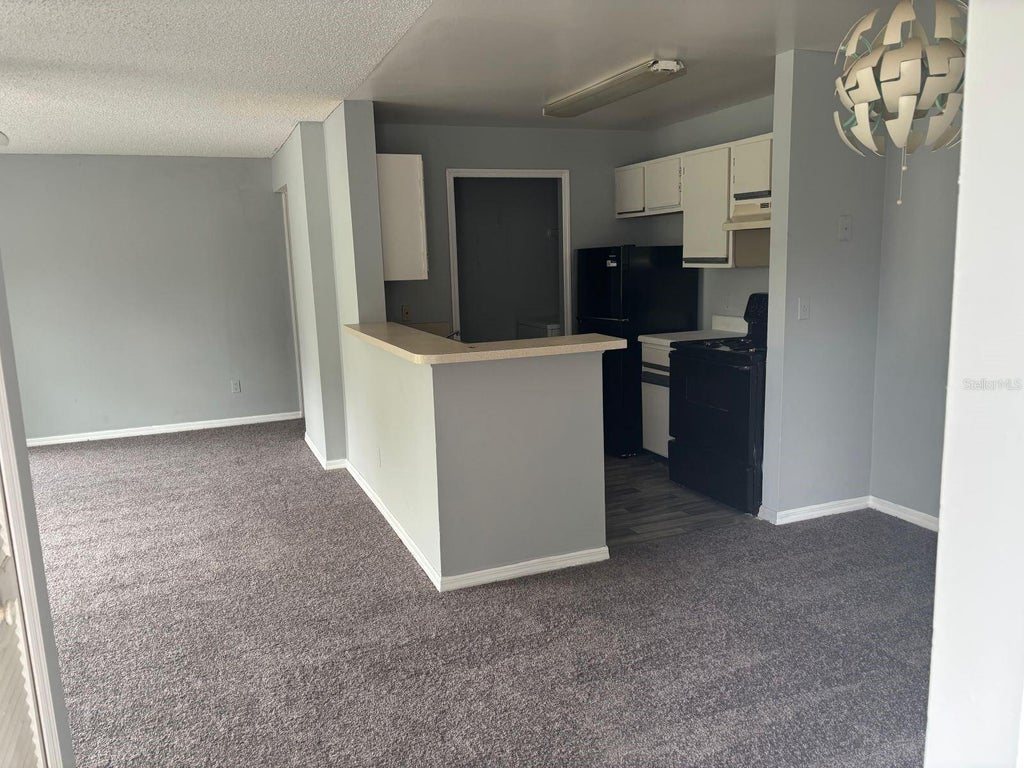 Photo of 6178 Westgate Drive #204, Orlando, FL 32835 (MLS # O6438086)