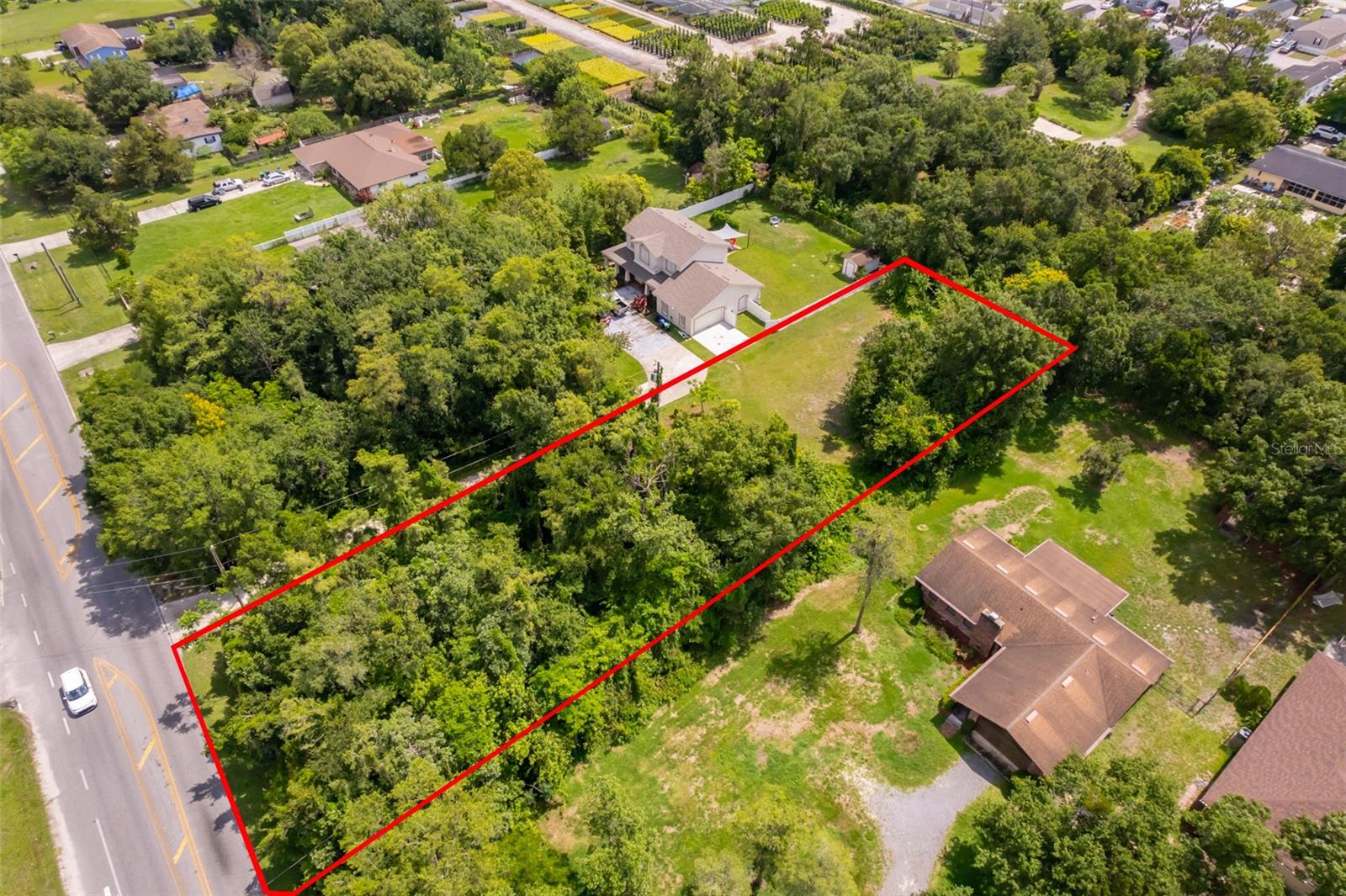 Prime Location! Extra Large Lot in an excellent location with water and electricity in Lot. Blue prints availiable for custome home if requested.
Share driveway (Driveway and Fence from adjecent lot encroachig onto the lot)