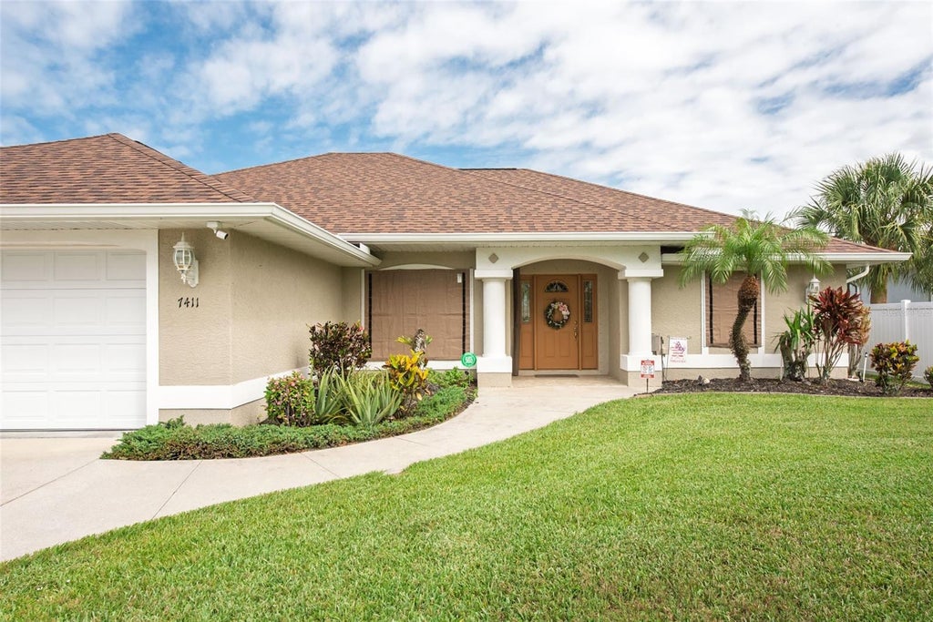 Photo of 7411 Snow Drive, Englewood, FL 34224 (MLS # D6147654)