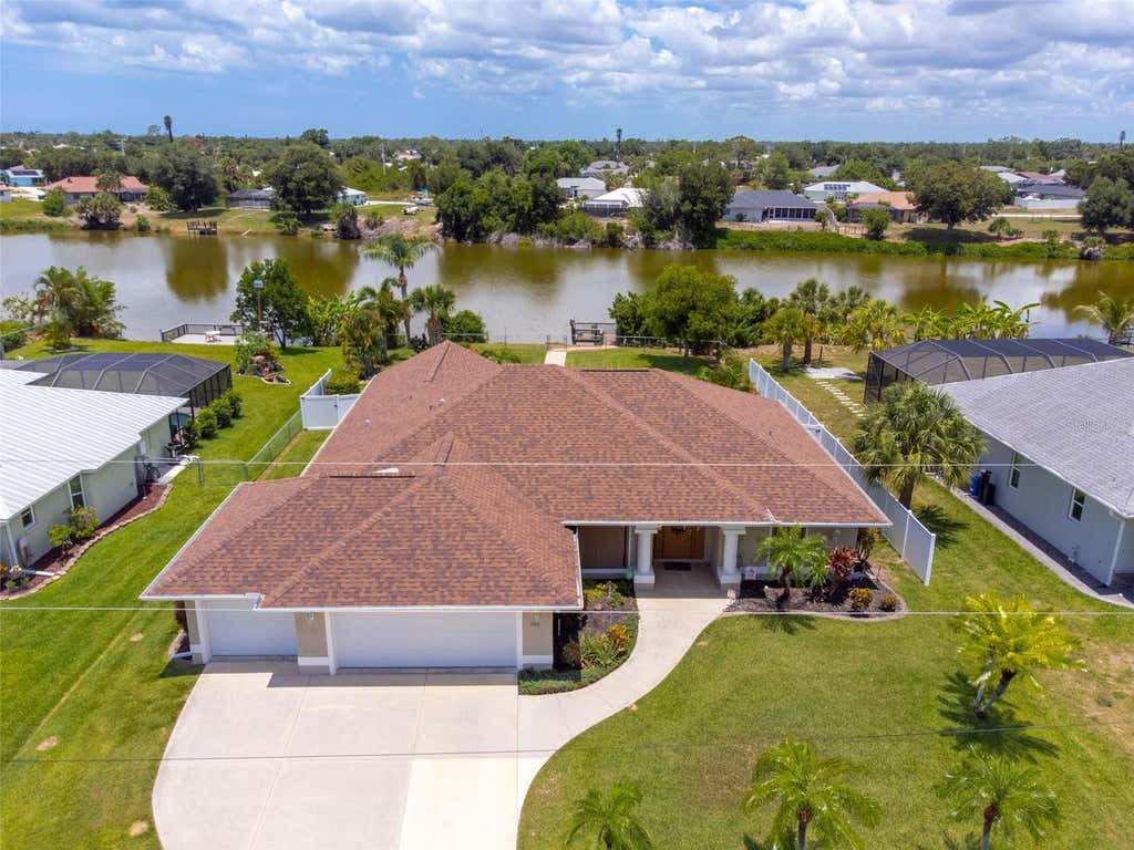 Photo of 7411 Snow Drive, Englewood, FL 34224 (MLS # D6147654)