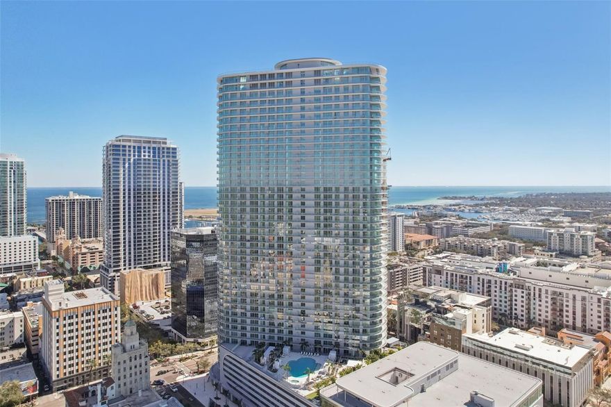 One or more photo(s) has been virtually staged. Elevate your lifestyle at The Residences at 400 Central, the tallest residential tower on Florida's West Coast. This premier, newly completed (2026) condominium soars 515 feet above the city, offering a "community within a community" in the vibrant heart of downtown St. Petersburg. This sophisticated 2,658-square-foot residence features an expansive three-bedroom, three-and-a-half-bath open floor plan designed for modern luxury.

Sunlight pours through floor-to-ceiling glass, illuminating the sleek, clean-lined interior. Large sliding doors open from the main living areas and owner's suite to expansive wrap-around terraces. These private outdoor retreats, framed by glass railings, offer seamless indoor-outdoor living and breathtaking, panoramic views stretching from the sparkling waters of Tampa Bay to the Gulf of America. The extensive 1000 sq ft wrap-around terrace runs the entire length of the residence, providing outdoor living and panoramic views from the living/dining room and every bedroom.

Residents enjoy unparalleled amenities, including a 46th-floor Sky Lounge Observatory—the highest point in the city—along with a resort-style pool deck, a state-of-the-art fitness and wellness center, and a theater lounge. Ideally positioned for an active urban lifestyle, this home is just moments from the waterfront excitement of the St. Pete Pier, the lush green spaces of Vinoy Park, and the iconic Vinoy Resort. You are also moments from the dining and shopping of Beach Drive and the world-renowned Dalí Museum. For easy travel, you are a short drive from both St. Pete-Clearwater International Airport and Tampa International Airport.