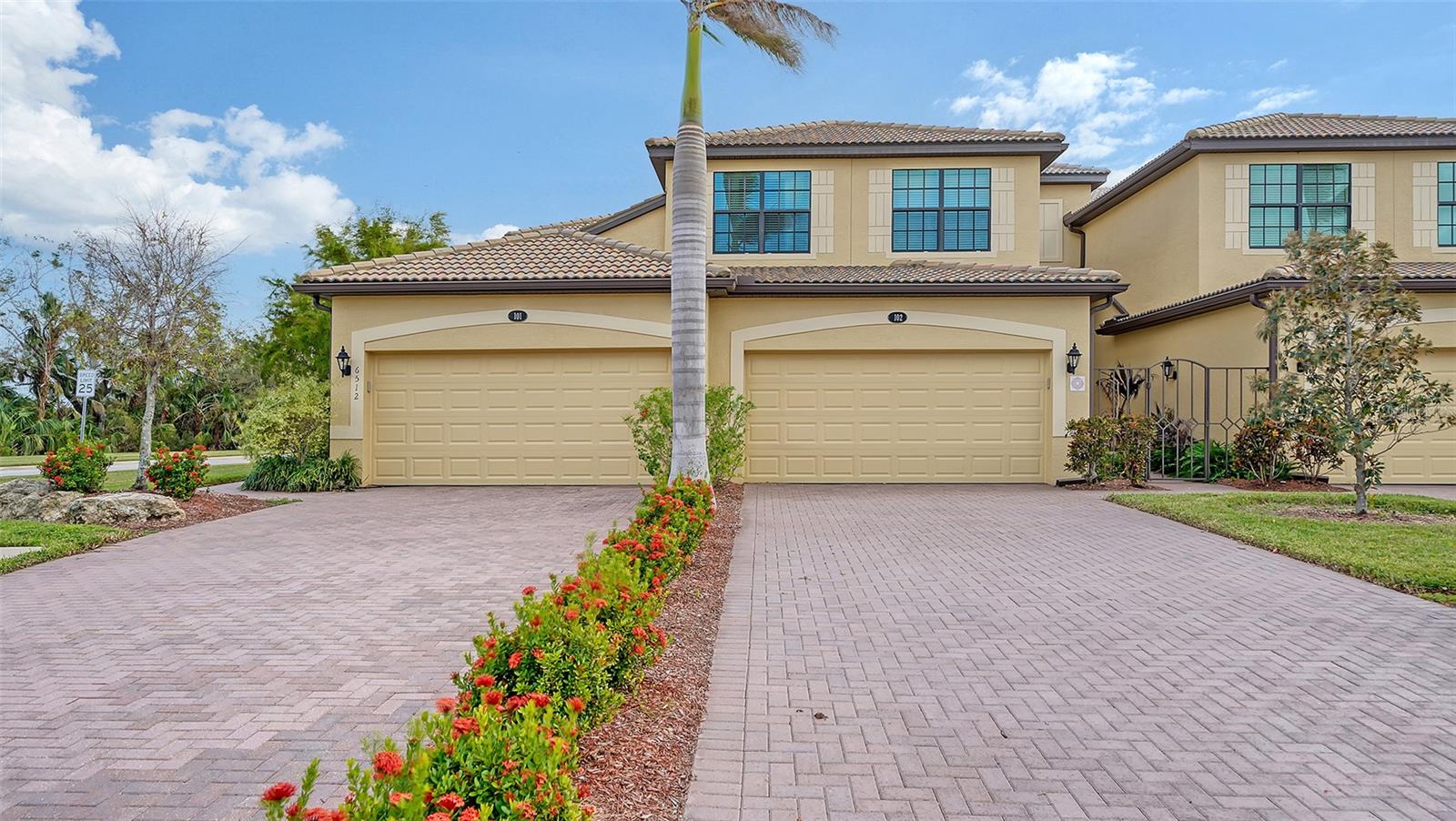 Come and enjoy this 2nd floor Coach home with a 2 car garage in River Stand gated community. This lovely bright unit has been freshly painted through out. The three bedroom split floor plans is exceptional for guest to visit. The open living area and high ceiling makes this 2100 sq ft unit feel bigger. A wonder covered screen Lanai is were you will spend most of your time enjoying the green belt, lake and distance golf course views. The over sized 2 car garage is equipped with an electrical hook up for a car charger for those with electric cars. This unit comes with a Social membership only no golf. Come and explore all the other activities that River Strand has to offer with Pro tennis lessons at one of 9 courts, 8 light pickleball courts, 2 Heated community pool with many satellite pools close by for easy use. 2 Fitness centers, basketball court, Billards room, Business center or meeting room, pool side Tiki bar, full sized restaurant and bar at the main clubhouse.