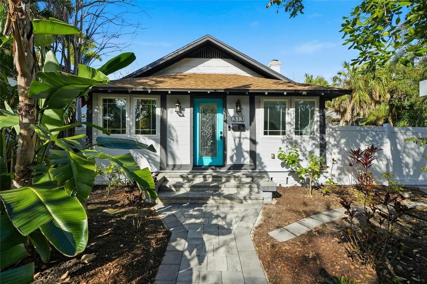 One or more photo(s) has been virtually staged. Welcome to Historic Old Northeast living at 313 23rd Ave N! This beautifully maintained 3-bedroom, 2-bath home blends classic 1938 charm with modern updates in one of St. Pete's most walkable neighborhoods. Step inside to a welcoming foyer with a versatile nook, perfect for a home office, storage, or creative workspace. Original wood floors and abundant natural light flow throughout the home, creating a warm, inviting atmosphere. The living room features a decorative fireplace that adds timeless character. To the left, the front bedroom offers its own bonus nook ideal for a reading corner or workspace. The completely updated kitchen showcases stone countertops, stainless steel appliances, and plenty of storage. A convenient laundry room leads off the kitchen for easy access. Down the hallway, you'll find two additional bedrooms. The guest bath features a tub/shower combo, while the primary suite includes an ensuite bathroom with dual sinks and a stand-up shower. The backyard is an entertainer's dream! The expansive deck, accessible from both the primary bathroom and laundry room, overlooks a beautifully landscaped yard with white vinyl fencing, a firepit, paved pathways, and a convenient dog door for your furry friends. The property also includes a 1-car garage with Tesla charger and an additional paved parking pad off the back alley. Old Northeast delivers the best of St. Pete living. You're minutes from the vibrant 4th Street corridor with its eclectic mix of local restaurants, coffee shops, and boutiques. Publix and Whole Foods are both within a 5-minute drive. Downtown St. Pete is less than 10 minutes away, offering world-class dining, the Museum of Fine Arts, Mahaffey Theater, and St. Pete Pier. The Tampa Bay waterfront, Vinoy Park, and North Shore Park are just a short bike ride away. Gulf beaches are less than 20 minutes from your door, and I-275 access makes commuting to Tampa easy. Rent is $4,500 per month and tenants set up utilities in their name for direct control and flexibility. Renters insurance is required at $45 per month through our program Beagle. Application fee is $65 per adult (18+) and we run background checks, credit checks, and verify work and rental history. Upon approval, a one-time $100 tenant processing fee applies. First month's rent and security deposit of $4,500 each secure your move-in date. Pet-friendly with up to 3 pets welcome! $300 pet fee per pet includes professional duct cleaning at move-out, plus $25 per month pet rent per pet. All applicants complete pet screening through petscreening.com. Schedule your showing today!