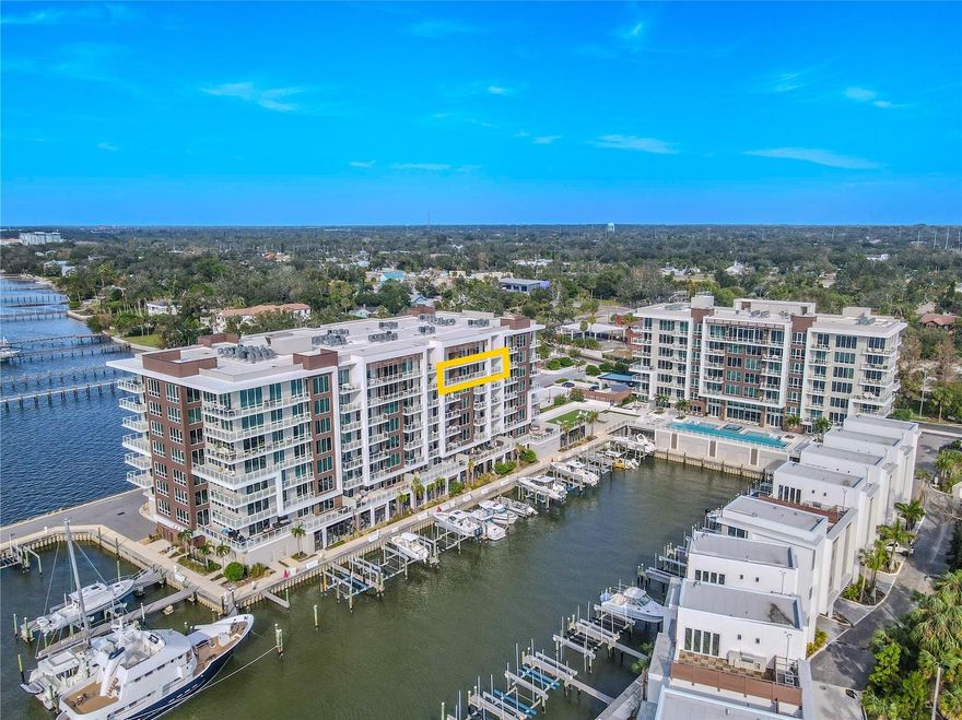 Experience refined coastal living in this exceptional 7th-floor residence within Clearwater’s premier waterfront community, Marina Bay. This 3-bedroom, 4-bath condominium combines elegant design, modern construction, and resort-style amenities with stunning views of the Intracoastal Waterway and marina.

A spacious, open, split-floor plan welcomes you with large-format tile flooring and expansive living and dining areas. Floor-to-ceiling, hurricane-rated windows and glass doors flood the home with natural light while showcasing panoramic water and skyline views. Electric window shades throughout add effortless comfort and privacy.

The gourmet kitchen features sleek cabinetry, quartz countertops, and an oversized island with seating, framed by elegant crystal pendant lighting. The kitchen is outfitted with a full suite of premium stainless-steel appliances, including a French door refrigerator, wall oven, dishwasher and built-in microwave. A custom walk-in pantry includes pull-out drawers, adjustable shelving, and closed cabinetry designed for organization and ease.

The primary suite exudes understated sophistication, complete with a spa-inspired bath featuring dual vanities, polished quartz counters, a frameless glass shower, refined designer fixtures, a private water closet, and a freestanding soaking tub that serves as the elegant focal point. Each additional bedroom includes its own ensuite bath with contemporary tilework and modern finishes, ensuring privacy and comfort for family or guests.

Additional highlights include a spacious laundry room, multiple storage options, and two assigned parking spaces (#88 and #45) in the secure, gated underground garage. The property also provides electric vehicle charging stations for convenience and sustainability.

Enjoy an impressive collection of resort-style amenities: a 25-meter heated saltwater lap pool with spa and two baja shelves, fitness center, sauna, steam room, putting green, and a stylish clubroom with catering pantry. The waterfront promenade and private marina create an ideal setting for evening strolls or sunset views.

Built to the highest standards, Marina Bay features sound-insulated construction and top-quality hurricane-proof windows and doors. Expansive terraces with glass railings maximize views of the Intracoastal and marina. Residents enjoy a 24/7 concierge service, a full-time on-site property manager, and secure access for added peace of mind.

Located just minutes from Clearwater Beach and downtown, this residence captures the best of luxury coastal living — modern elegance, convenience, and breathtaking water views in every direction.