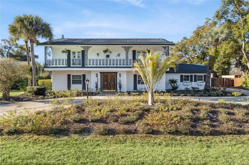 Photo of 7621 Orange Tree Lane, Orlando, FL 32819 (MLS # O6377839)