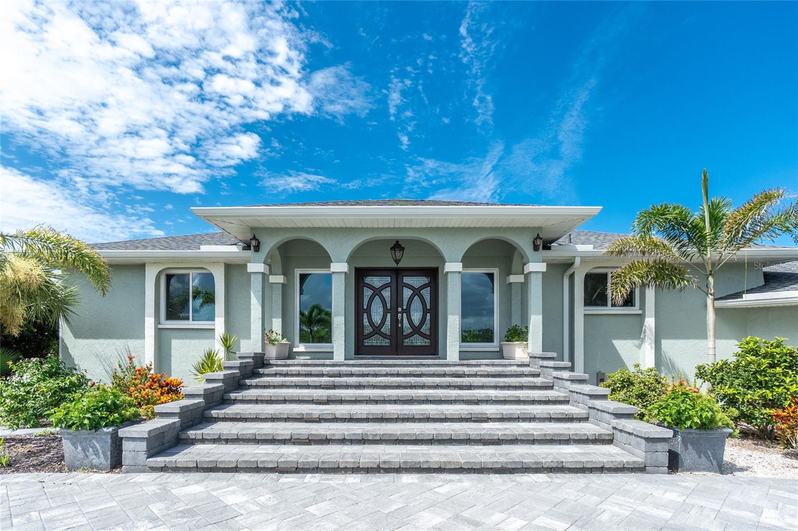 This spacious, beautifully landscaped waterfront home is a must-see. Located in historic Cape Haze, one of the most sought-after neighborhoods in Charlotte County. This home is a boater’s dream, sitting on a deep-water canal with an extra-large covered boat lift. Minutes to the Intracoastal Waterways, the Gulf of Mexico, and Boca Grande Pass. It provides superb boating access. This three-bedroom, two-bathroom home has almost too many upgrades to mention. The newly renovated kitchen, master bath, new impact windows and doors, new roof, and new HVAC system are just a few of the features. The house has a large lower multipurpose area that provides additional space, with a walkout to the covered lanai and pool area. There is a 50ft x 14ft heated saltwater lap pool, a 10ft x 6ft spa, and a 24ft x 10ft sun shelf. Huge, lighted, circular, paver driveway providing easy access and extra parking. Located just minutes from shopping, fine dining, world-class fishing. Schedule your private showing to see this one-of-a-kind home today.