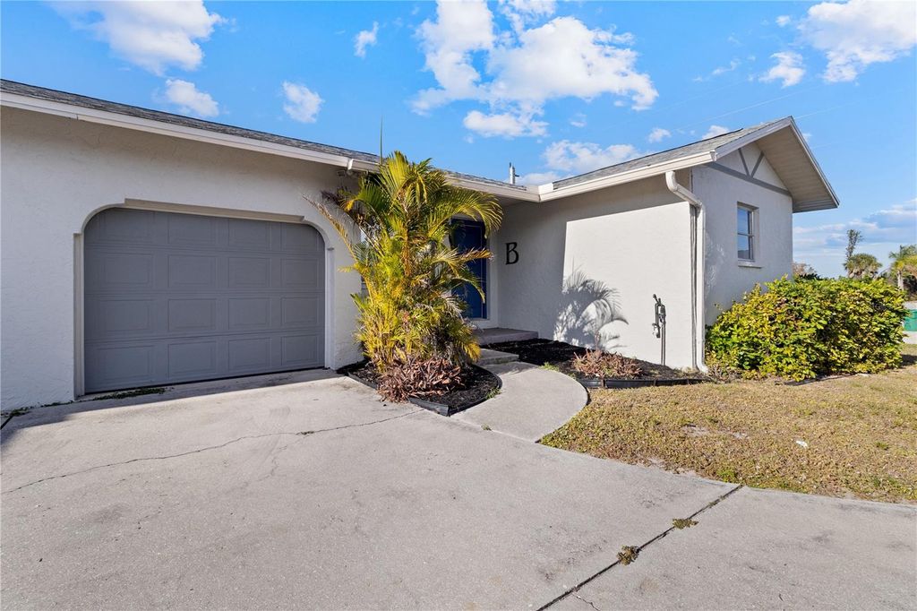 Photo of 51 Boundary Boulevard #B, Rotonda West, FL 33947 (MLS # C7519532)