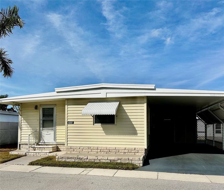 Don't miss this affordable priced 2bd 1 bath popular Golden Gate Expando model mobile home.  Easy living, well maintained resident owned 55+ community offers an open floor plan, updated windows and roof over. Combination of carpet and tile adds to the charm of this cozy home.  Kitchen has been remolded with Ikea cupboards and white appliances.  The large bathroom has an additional closet added for more storage. Newer HVAC, updated electric box, hot water tank and washer in the spacious shed.  The oversized car port accommodates 2 vehicles and a golf cart.  The monthly maintenance is only $210.00 a month includes water/sewer/trash.  Golden Gate offers a variety of social activities, large active clubhouse, heated pool and hot tub.  A well run co-operative with share value of $45,000.00 included in sales price.  20lb pets are welcome. 
Make this your winter home or your year round Florida retreat.